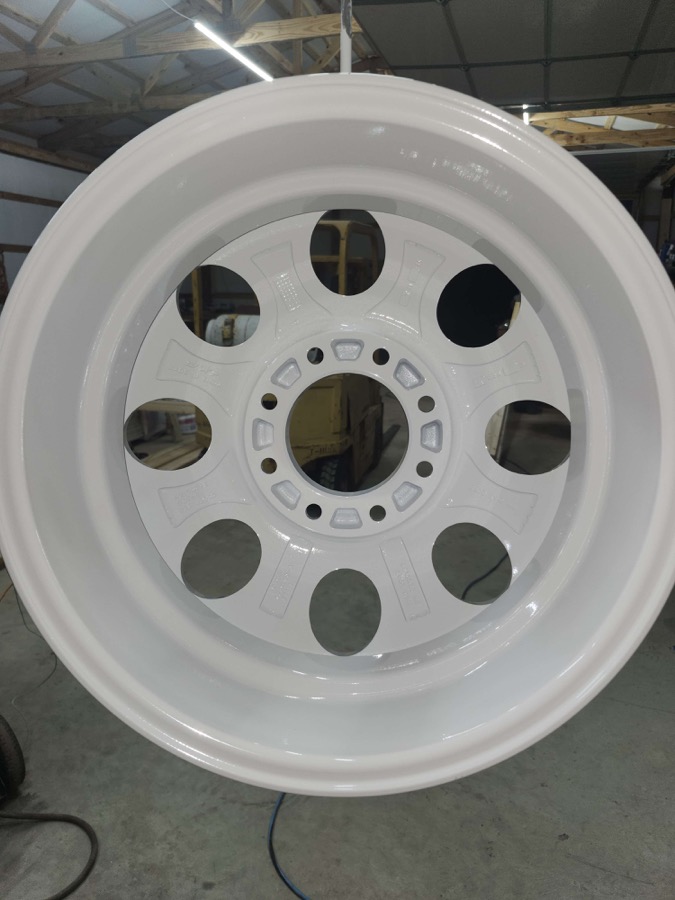 Gloss white wheel close-up showing the inner barrel finish